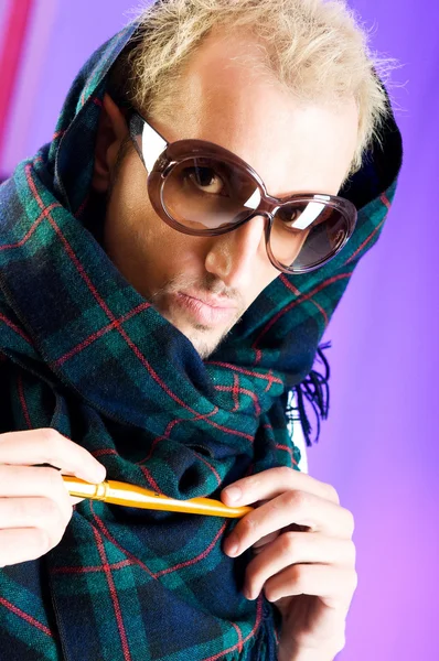 Man with glasses in studio shooting — Stock Photo, Image