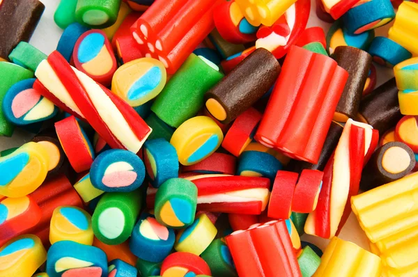 Fondo hecho de dulces de colores — Foto de Stock