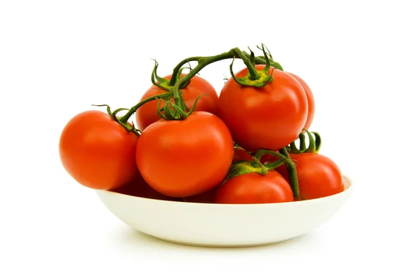 Tomates rojos aislados sobre el fondo blanco — Foto de Stock