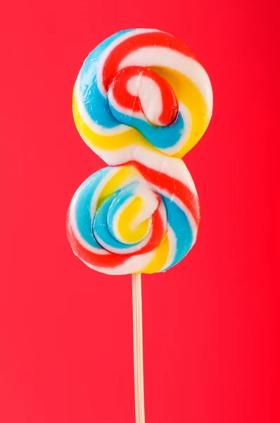 Colourful lollipop against the colourful background Stock Picture