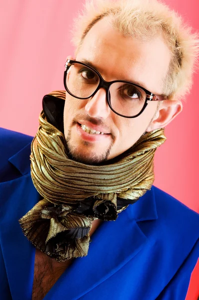 Man with blue jacket in studio shooting Stock Image