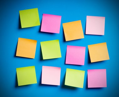 Reminder notes on the bright colorful paper clipart