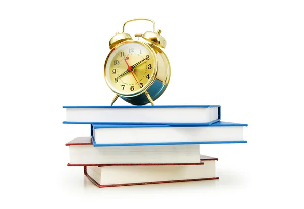 Tillbaka till skolan koncept med böcker och klocka — Stockfoto