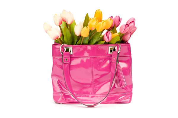 Bag and flowers isolated on the white background — Stock Photo, Image
