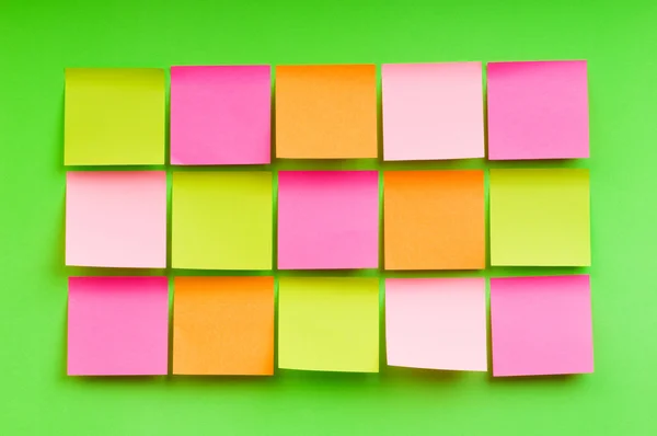Reminder notes on the bright colorful paper — Stock Photo, Image
