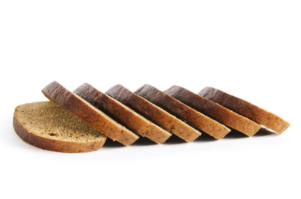 Plátky chleba izolovaných na bílém pozadí — Stock fotografie