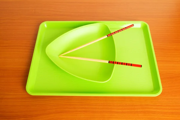 Plaka ve yemek çubukları ile Asya gıda kavramı — Stok fotoğraf