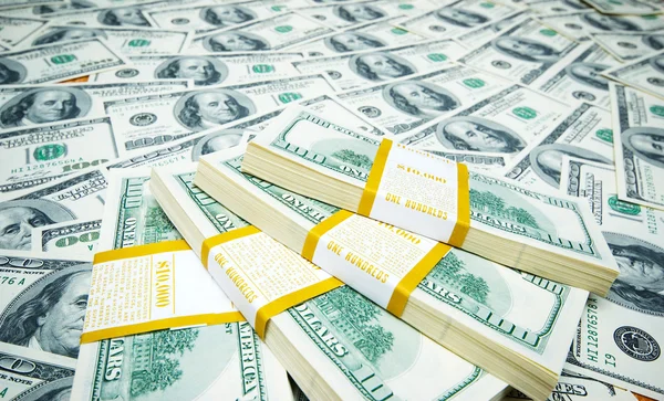 Dollar-Stapel auf Geld-Hintergrund — Stockfoto