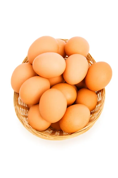 Huevos marrones en la cesta en blanco — Foto de Stock