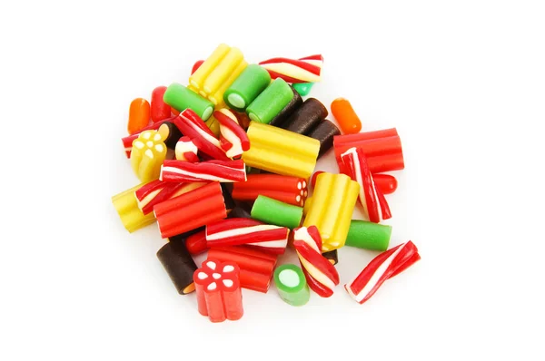 Färgglada sötsaker isolerat på den vita bakgrunden — Stockfoto