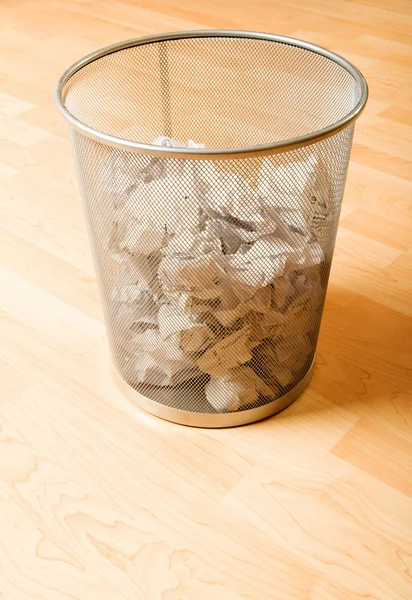 Garbage bin with paper waste isolated on white — Stock Photo, Image