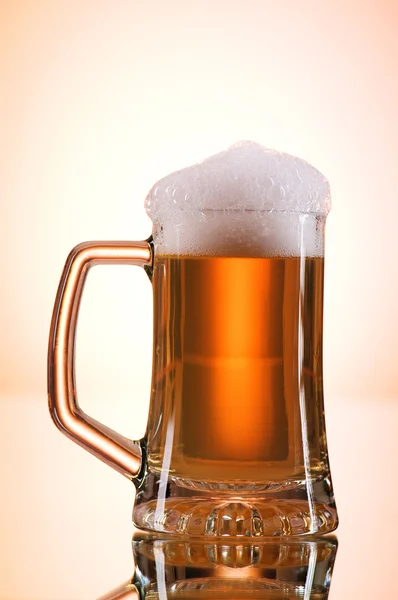 stock image Beer glasses against the colorful gradient background