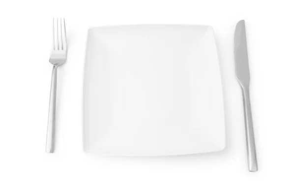 Set de utensilios dispuestos sobre la mesa —  Fotos de Stock