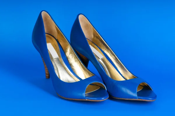 Fashion concept with blue woman shoes on high heels — Stock Photo, Image