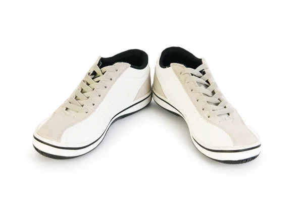 Sapatos esportivos isolados no fundo branco — Fotografia de Stock