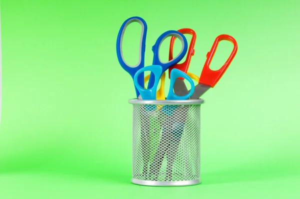 Colorful scissors on the color paper background — Stock Photo, Image