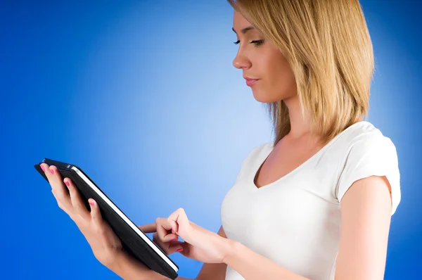 Girl working with the portable tablet computer — Stock Photo, Image