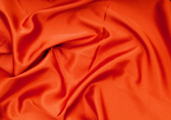 Bright satin fabric folded to be used as background — Stock Photo, Image