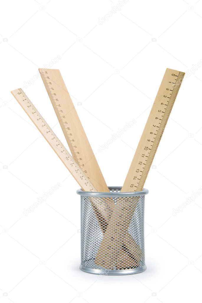 Wooden rulers isolated on the white background