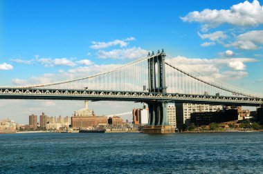 Brooklyn bridge in New York on bright summer day clipart