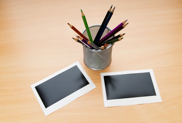 stock image Blank instant photos and pencils on the wooden table