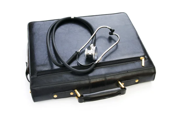 Astuccio e stetoscopio isolati sul bianco — Foto Stock