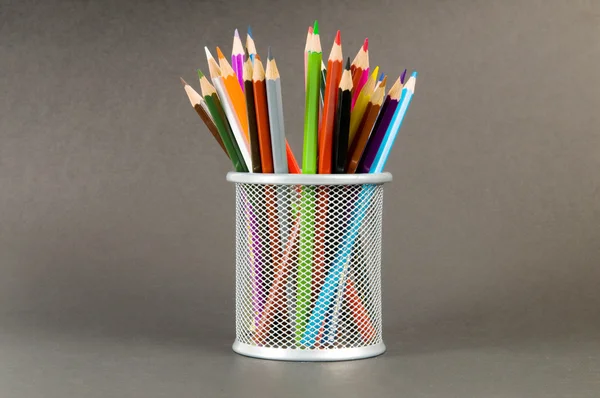 Many colorful pencils on the color background — Stock Photo, Image