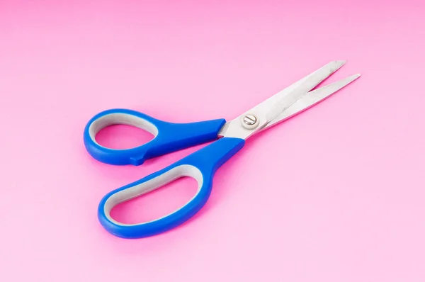 stock image Colorful scissors on the color paper background