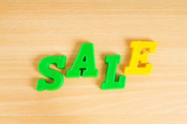 The word sale made of plastic letters — Stock Photo, Image