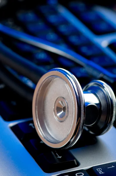 stock image Stethoscope and keyboard illustrating concept of digital securit