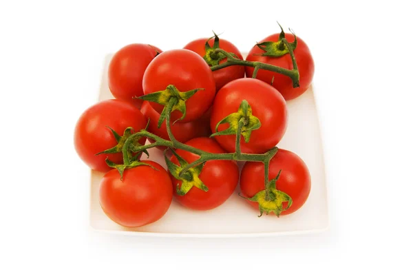 Červená rajčata izolovaných na bílém pozadí — Stock fotografie