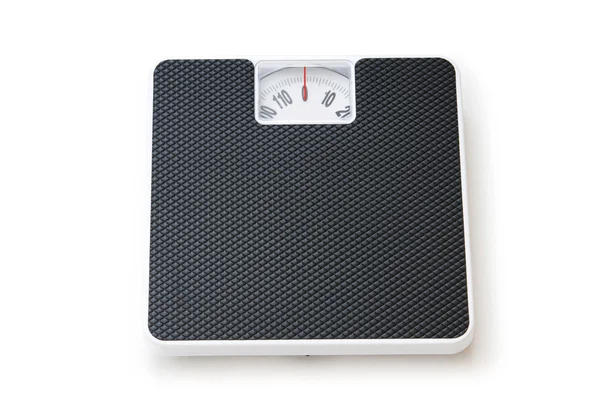 Conceito de dieta com escalas isoladas no branco — Fotografia de Stock