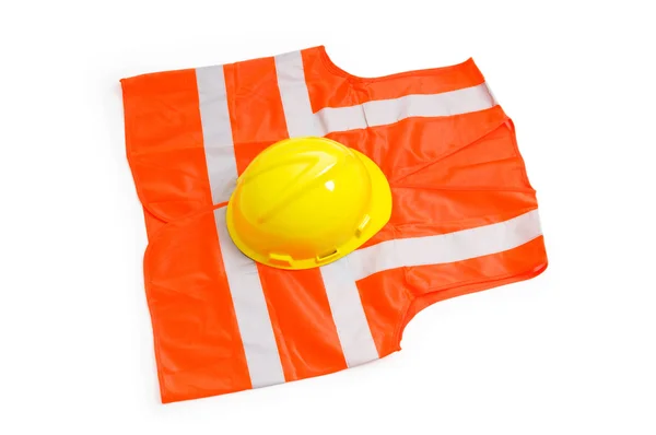 Oranje vest en veiligheidshelm geïsoleerd op de witte — Stockfoto
