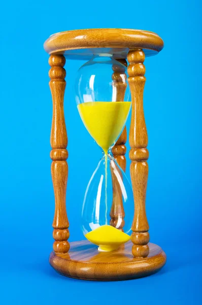 Time concept - hourglass against the gradient background — Stock Photo, Image