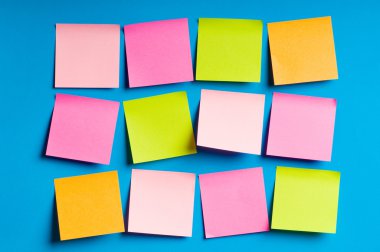 Reminder notes on the bright colorful paper clipart