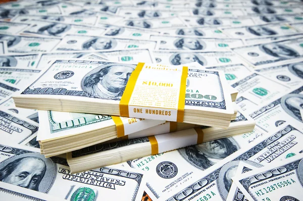 Dollar-Stapel auf Geld-Hintergrund — Stockfoto