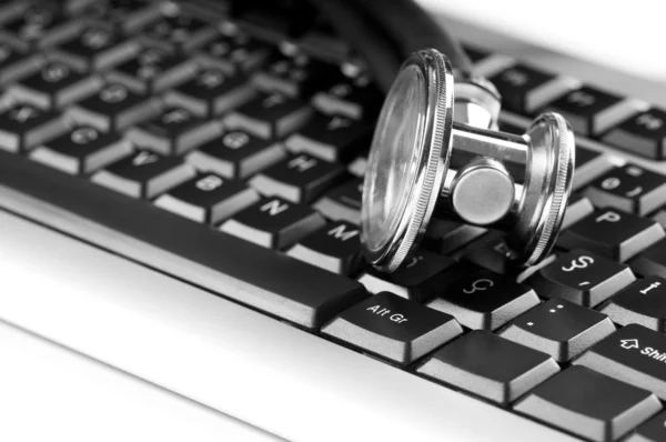 stock image Stethoscope and keyboard illustrating concept of digital security