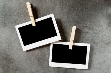 Designer concept - blank photo frames for your photos clipart