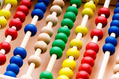 Education concept - Abacus with many colorful beads