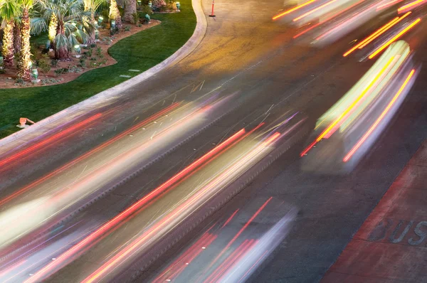 Moving traffic and car lights in the evening — Stock Photo, Image