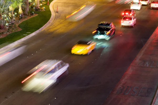 Moving traffic and car lights in the evening — Stock Photo, Image