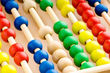 Education concept - Abacus with many colorful beads