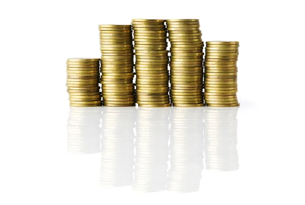 Pila di monete isolate sul bianco — Foto Stock