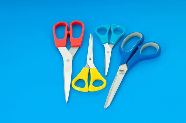 Stock image Colorful scissors on the color paper background