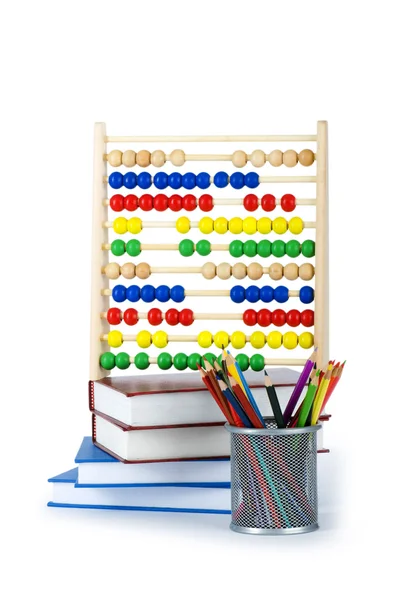 Utbildning koncept med pennor, böcker och abacus — Stockfoto