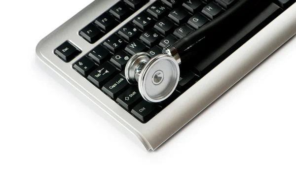Stethoscope and keyboard illustrating concept of digital securit — Stock Photo, Image