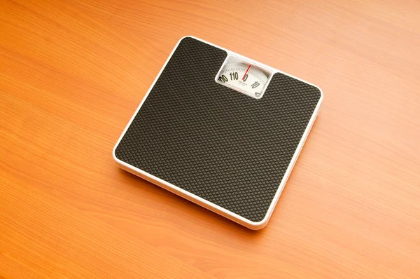 Dieting Concept Scales Wooden Floor — Stock Photo, Image