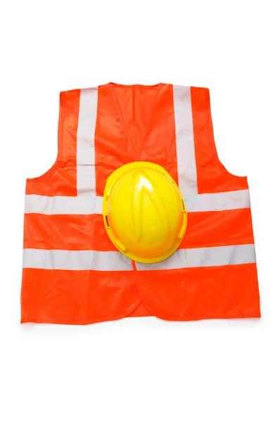 Oranžovou vestu a bezpečnostní přilba izolovaných na bílém — Stock fotografie