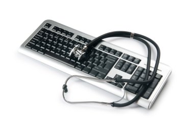 Stethoscope and keyboard illustrating concept of digital securit clipart