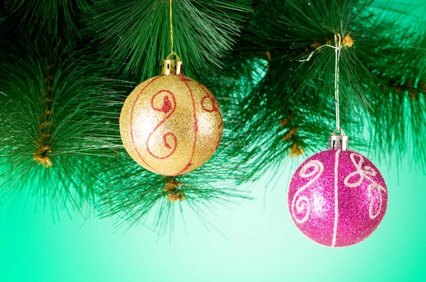 Christmas decoration against the colorful gradient background — Stock Photo, Image